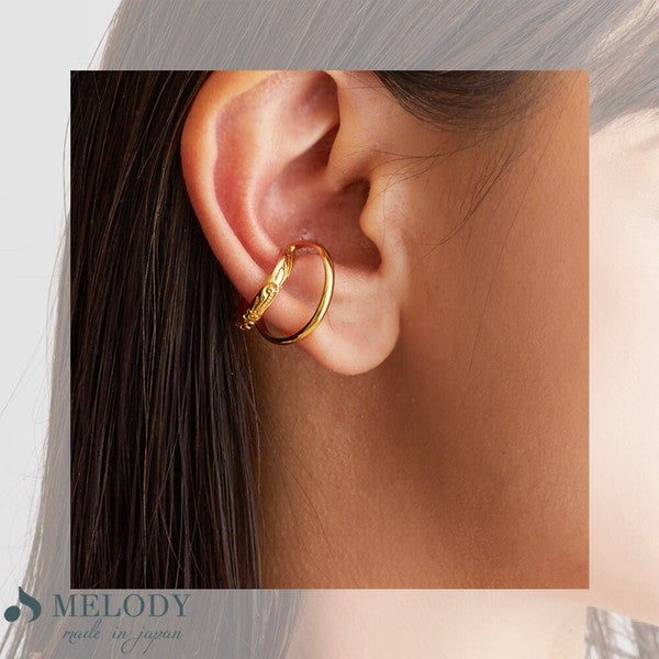 Hawaiian flower ear cuff on ear, UNIQKY