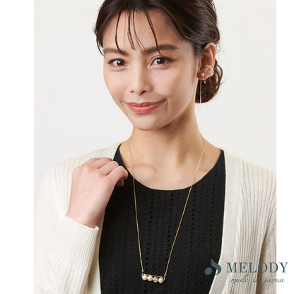 Pearl chain ear cuff on ear, UNIQKY