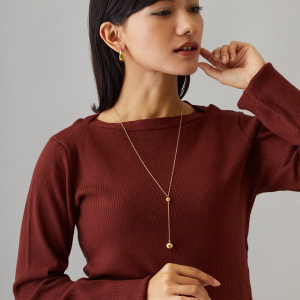 Model wearing gold Japanese handmade nickel-free Y-lariat necklace