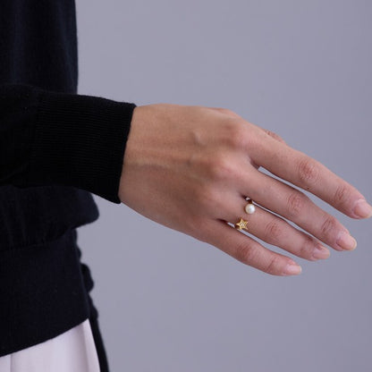 Model wearing made in Japan nickel-free star and pearl ring